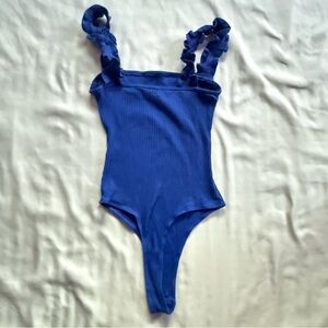 Blue women’s Mob Wife ribbed bodysuit with cute ruffle straps